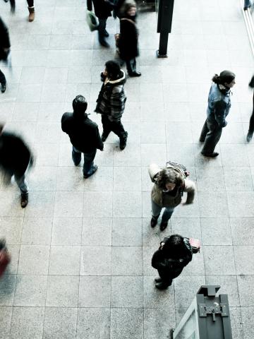 People walking in the street. Photo Timon Studler / Unsplash